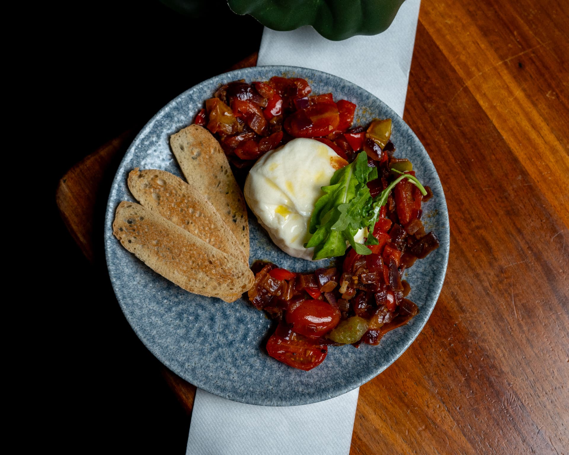 Burrata with tomato salsa and toasted bread at Jozi Gin